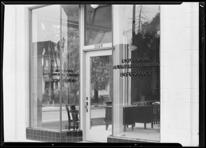 Windows in store at West 15th Street and South Broadway, Los Angeles, CA, 1931