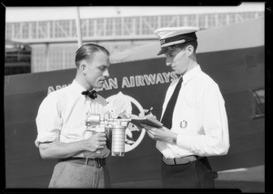 Shipping grease gun via American Airways - close up of gun, Burbank, CA, 1932