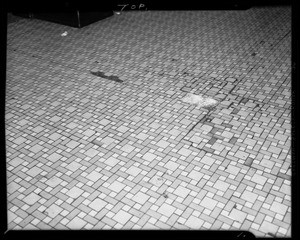 Hole in floor in Leighton's on Main Street opposite City Hall, Los Angeles, CA, 1940