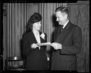 Check presentation at a club luncheon, Los Angeles, CA, 1940