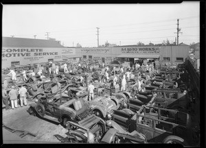 Yard full of burned cars at A-1 Auto Works after auto show fire, Los Angeles, CA, 1929