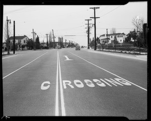 West Olympic Boulevard and South Lucerne Boulevard, wrecked Ford "A" roadster, Los Angeles, CA, 1940