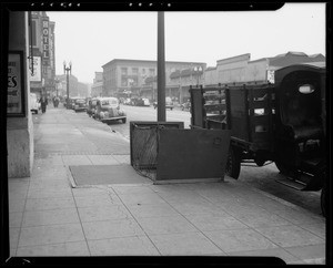 Chute in sidewalk, Famous Department Store, Southern California, CA, 1940