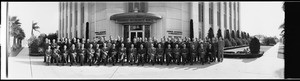 Group of men outside of Farmers Insurance Building, 4680 Wilshire Boulevard, Los Angeles, CA, 1946