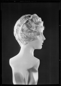 Hair dress on wax figure, May Co., Southern California, 1930