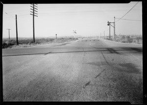 Dodge truck at Chrysler Corporation, intersection of 26th and Eastern, Chevrolet sedan at Stevens Garage, Southern California, 1934