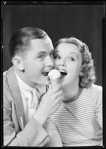 Girl and man eating ice cream cone, Southern California, 1932