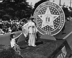 American Legion parade, Long Beach, float featuring the state seal of Oklahoma