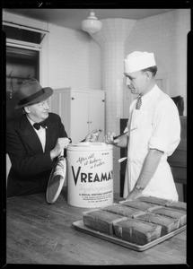 Mr. Eckdahl presenting can of Vreamay, Southern California, 1934