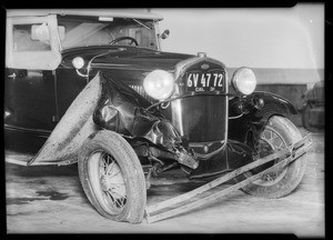 Wrecked Ford roadster, 1931 model car, belongs to Maria Martin, Southern California, 1931