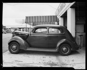 1937 Ford Tudor at Muller Bros. and 1931 Ford roadster at Coast Auto Works, Southern California, 1940