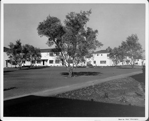 Wyvernwood Housing complex with 2-story units divided by greenbelt and walkways