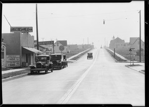 Buick and Ford at West 67th Street & South Van Ness Avenue, Los Angeles, CA, 1930