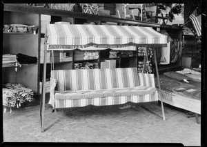 Couch and gas range stove, May Co., Southern California, 1931