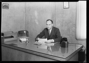 Mr. Christian at his desk, Pennzoil Co., Southern California, 1930