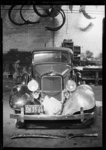 Wrecked Pontiac sedan, James G. Follet owner and assured, Southern California, 1935