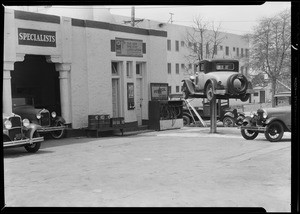 Cars & grease rack at service station, 4982 Hollywood Boulevard, Los Angeles, CA, 1931