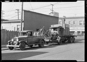 Tow car and wrecked truck, Southern California, 1932