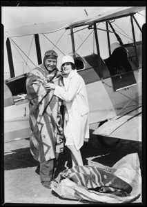 Olive Borden & Nassan, blankets at airport, Southern California, 1929