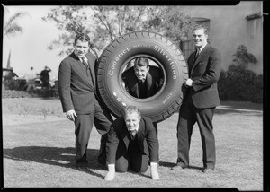 Notre Dame players & tire, Pacific Goodrich Rubber Co., Southern California, 1930