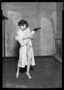 Nancy Carroll with gun, 'Chicago', Southern California, 1927