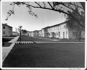 Wyvernwood Housing complex with 2-story units divided by greenbelt and walkways