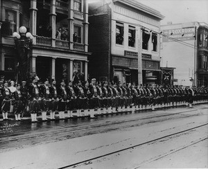 Shriner's parade in Los Angeles, standing at attention in front of Los Angeles Water Department, between 436 Hill Street and The Broxburn