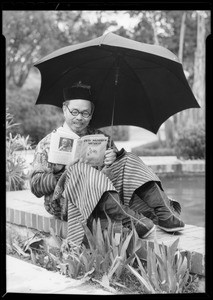 "Gin Chow" reading "Old Mother Mexico", Southern California, 1932