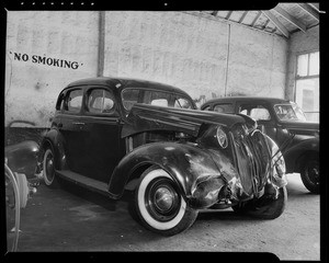 Ford sedan and Plymouth, Los Angeles, CA, 1940