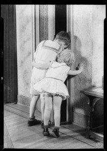 Kiddies peeping in closet, Southern California, 1932