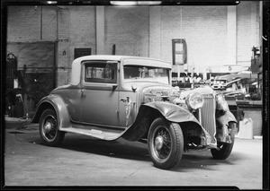 Cadillac, Chrysler, and intersection, case of Schyler Lodd, Southern California, 1932