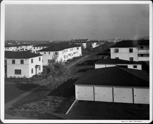 Wyvernwood Housing complex with 2-story units divided by greenbelt and walkways