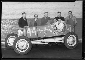 Ford V8 race car and driver and mechanics, Southern California, 1934