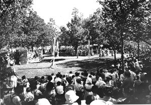 People watching an archery tournament at a Los Angeles city park