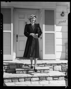 Girl leaving house to go shopping, Los Angeles, CA, 1940