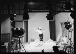 Shooting snow scene in studio, Southern California, 1931