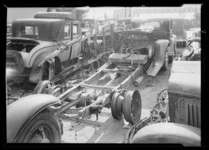 GMC truck in junkyard & broken motor, Mackey Truck Co. assured, Southern California, 1935