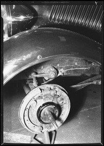 Installing hydraulic brakes on a Ford V8 & demonstration rack, Southern California, 1934