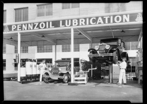 Exterior view of grease rack at Pellissier Square Garage, 828 South Western Avenue, Los Angeles, CA, 1931