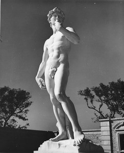 A low-angle full shot of the sculpture of David at the Forest Lawn Memorial Park