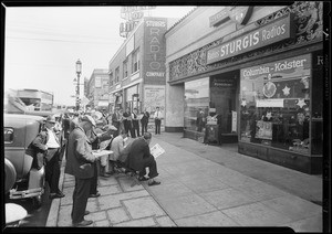 Crowd in front of Sturgis Radio store listening to World Series, Los Angeles, CA, 1929