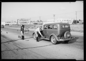 Cops testing brakes, Southern California, 1935