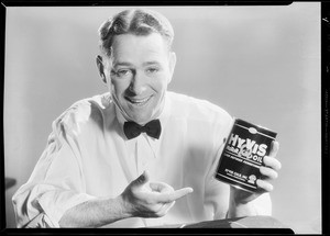 Service station man dispensing Hyvis Oil, Southern California, 1933