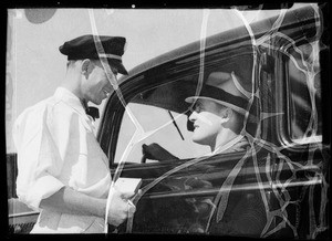 Salesman and customer in car, Southern California, 1935