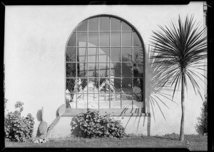 Alfred Carter's shop and Christmas window at home, Southern California, 1933