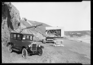 Chevrolet at road along cliff, repairing damage done by high water, Santa Monica, 1926