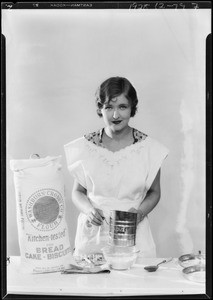 Gladys McConnell mixing dough, Southern California, 1928