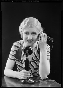 Woman in lingerie and at phone, Home Service Corporation, Southern California, 1931