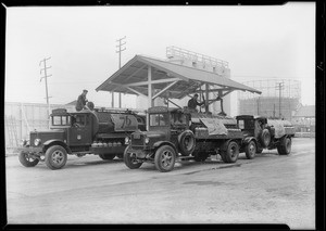 76 Gasoline banners on trucks, Southern California, 1931