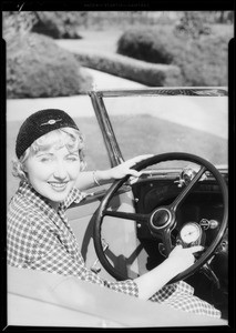 Genevieve Tobin & automobile radio, Southern California, 1933